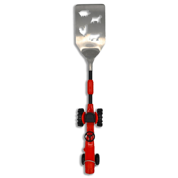 The Gibson Tractor BBQ Spatula features a detailed red farm tractor handle, bottle opener, hanging hook, and livestock themed die cuts in the stainless steel spatula blade. BBQ tools, barbeque tool, spatula, tractor spatula